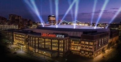 A picture of the Little Caesars Arena at night