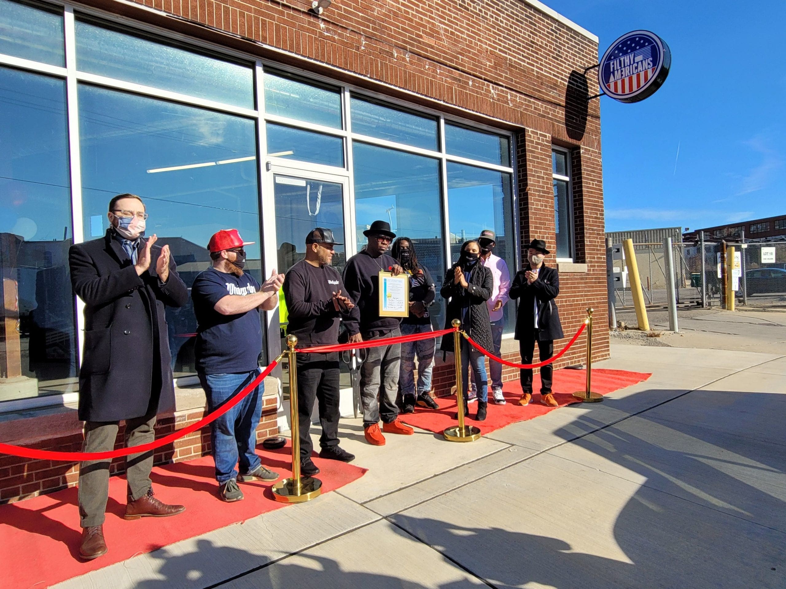 Ribbon cutting ceremony at Filthy Americans in Detroit